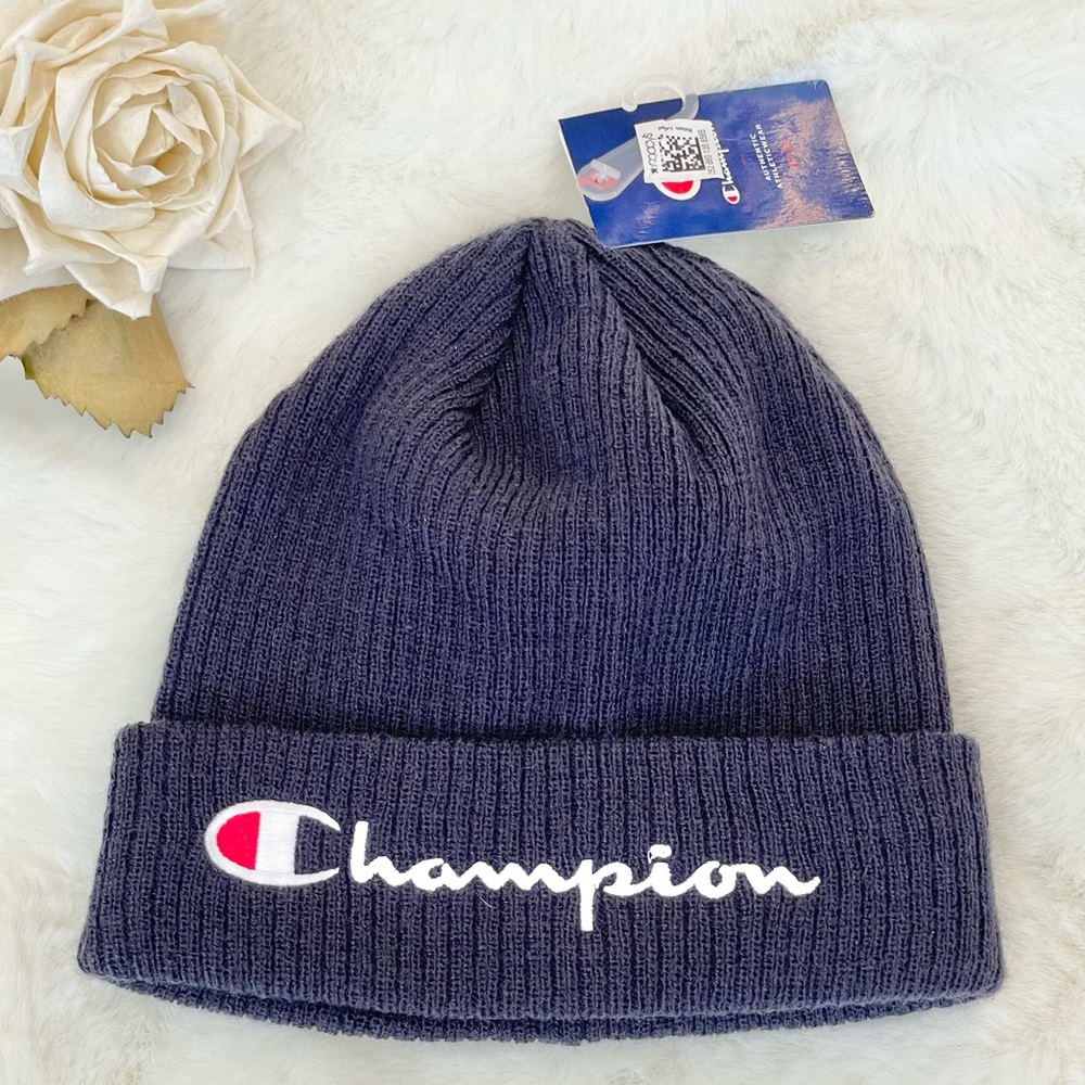 New with tag CHAMPION logo Hat. Navy Blue with white logo on front Hat is unisex
